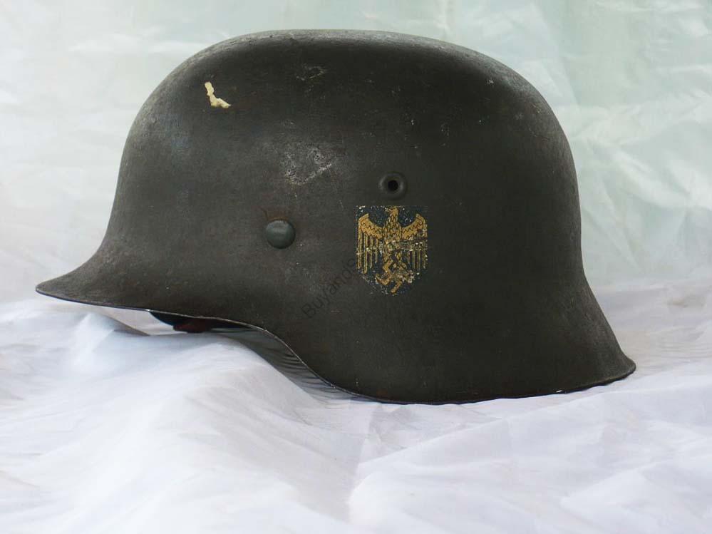 WWII German Heer M42 helmet with gold-toned eagle decal